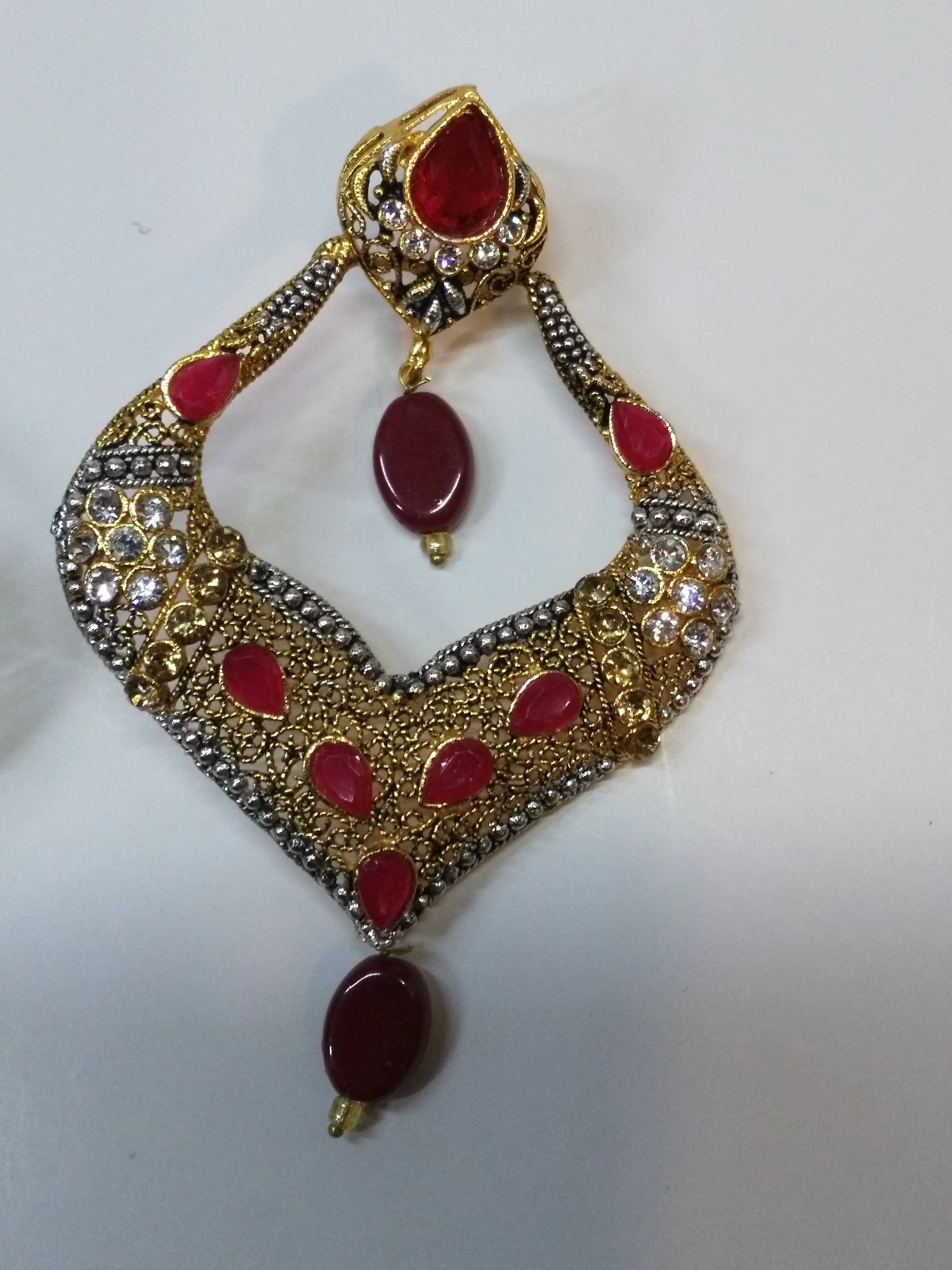 Red stones Spade Style Earrings with Gold-plated Base