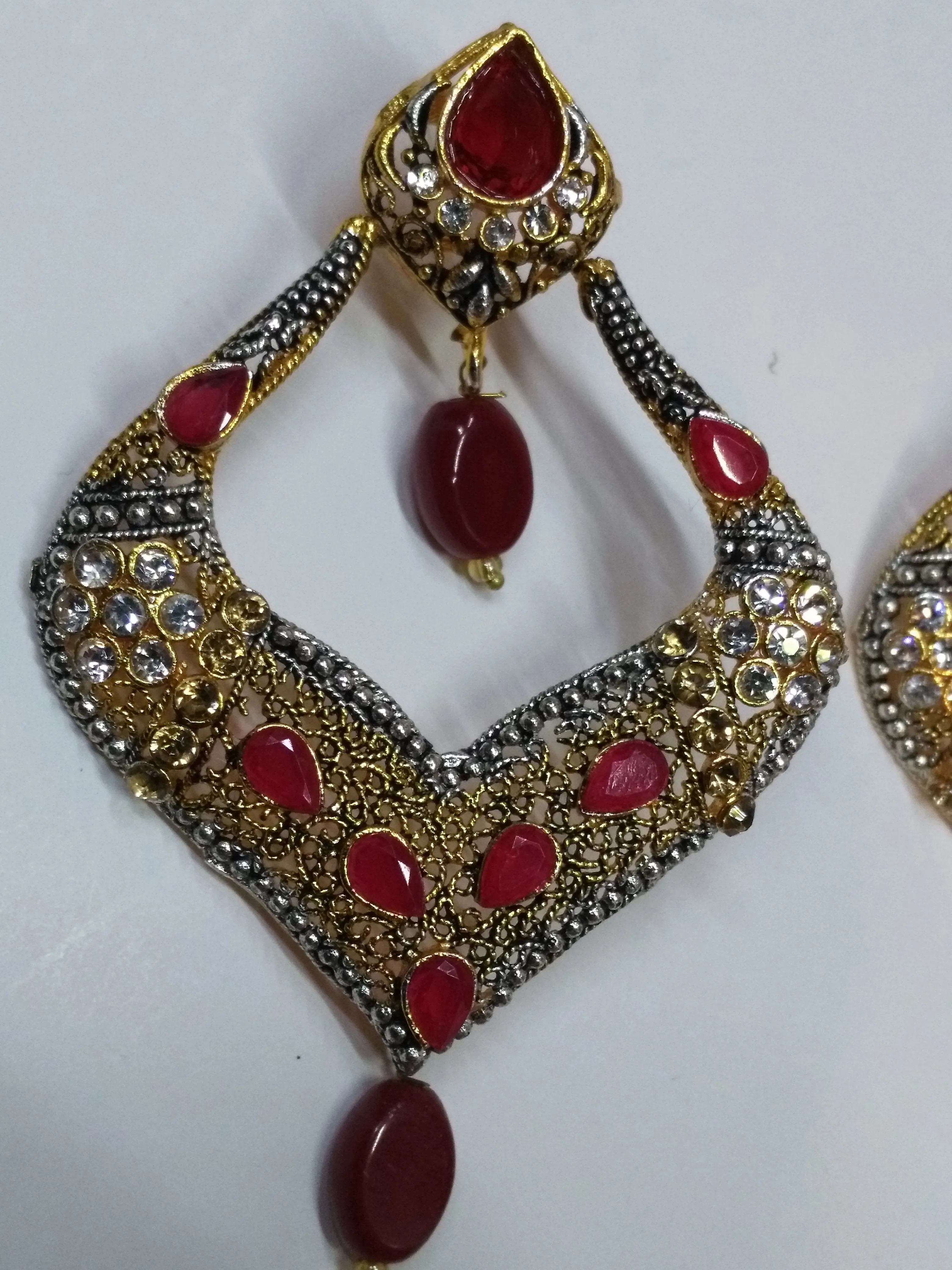 Red stones Spade Style Earrings with Gold-plated Base